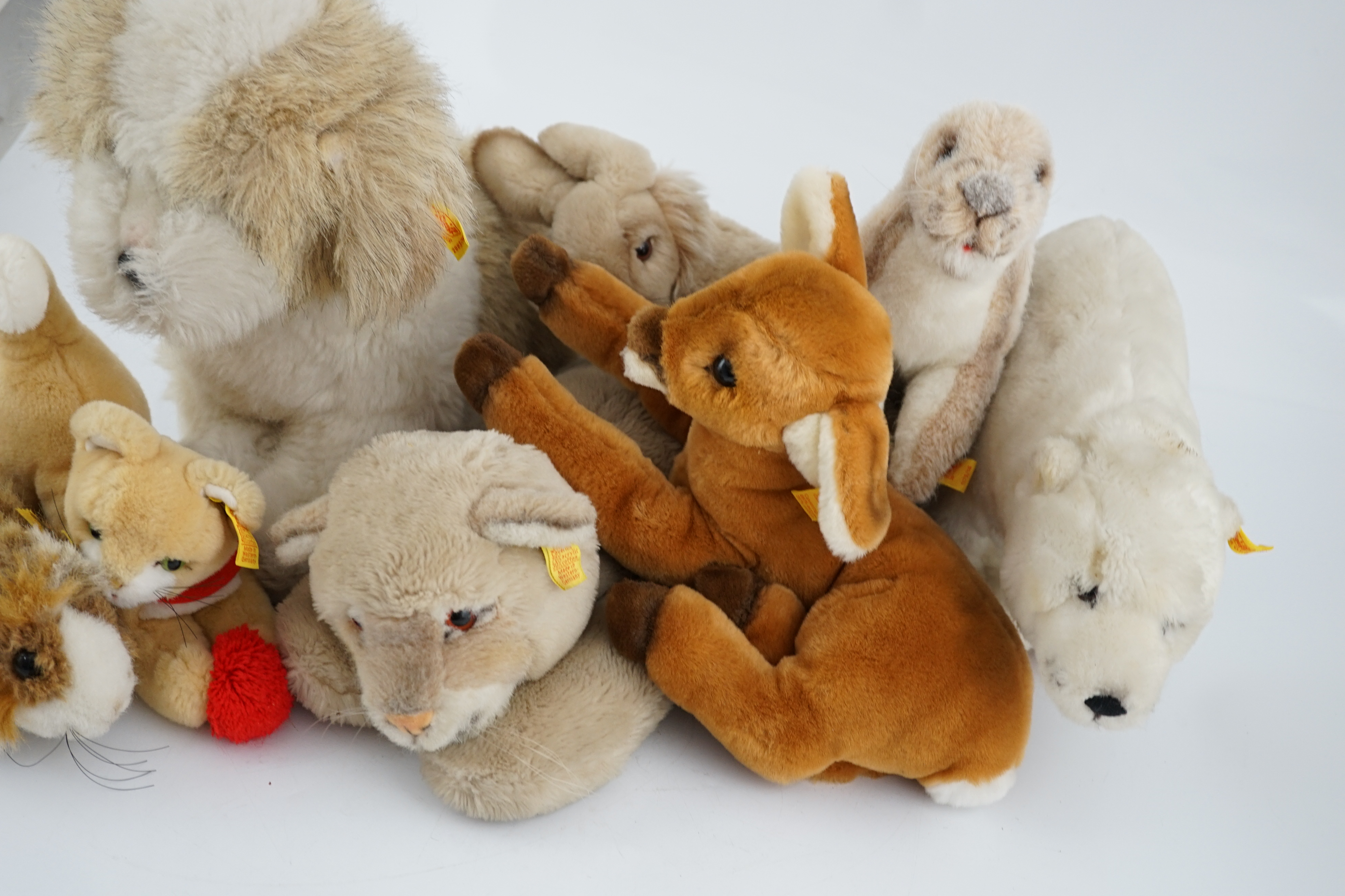 Ten assorted Steiff yellow tag animals, two yellow tag bears, together with Steiff catalogues